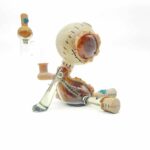 Muller Glass Sitting Doll